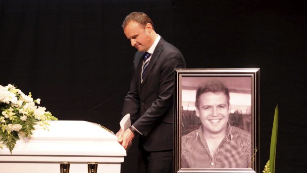 Farewelled: Deputy Chief Minister Andrew Barr says goodbye to his staff member Kurt Steel, who was killed in a bus crash in Bolivia.