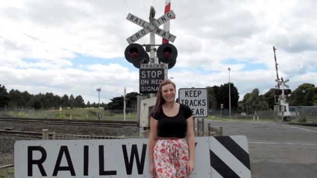 Emma Henderson, the 2007 dux of Northern Bay College (then Corio Bay), standing on the Corio side of the railway tracks that divides the two schools.