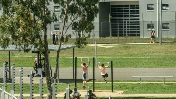 Prisoners exercise in  the yard at the Melbourne Remand Centre. 