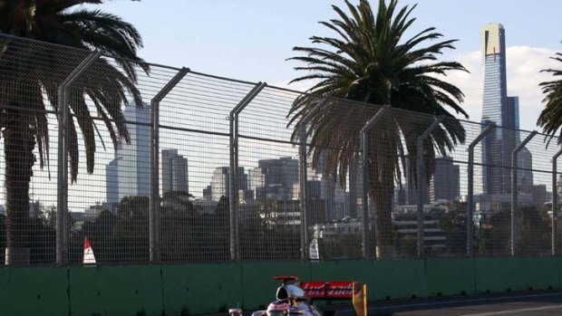 Go to whoa &#8230; Jenson Button sends his McLaren down the back straight at Albert Park on his way to a season-opening win.