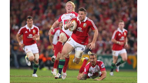 Tommy Bowe, seen here making a break in the game between the Lions and the Queensland Reds, has rejected suggestions the visitors are tired and had deliberately slowed play to keep the Wallabies in check in the first two Tests.