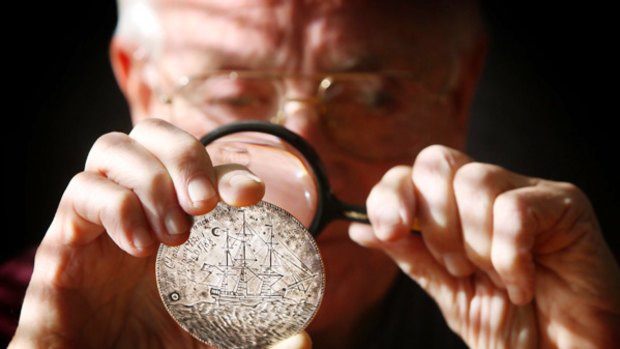 Ship-shape: John Chapman holds a silver disc engraved by First Fleet convict Thomas Barrett.