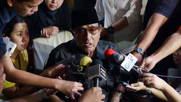 It's mine: Sultan Jamalul Kiram III explains his claim to reporters at his home in Manila.
