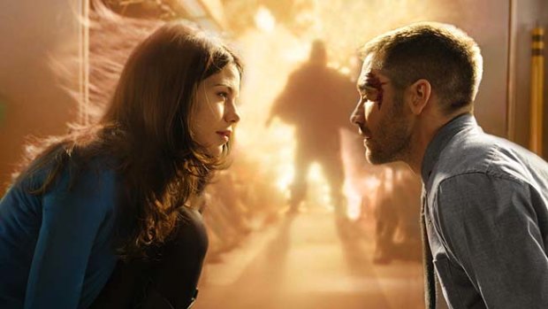 I can read you like an encrypted password: Michelle Monaghan and Jake Gyllenhaal in the nifty sci-fi thriller Source Code.