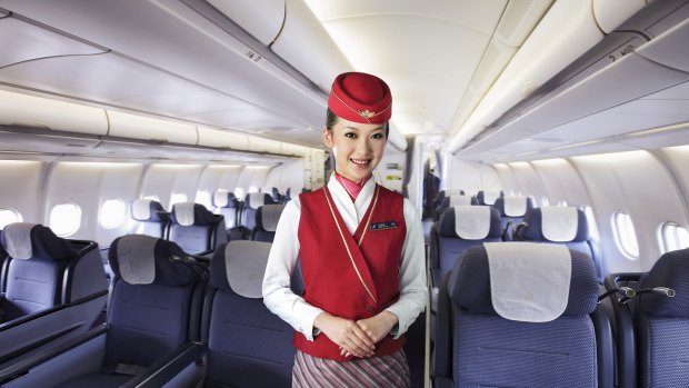 A flight attendant on a China-domiciled airline.
