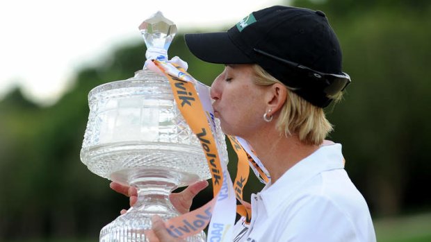 Sweet success: Winner Karrie Webb has a kiss for the cup.