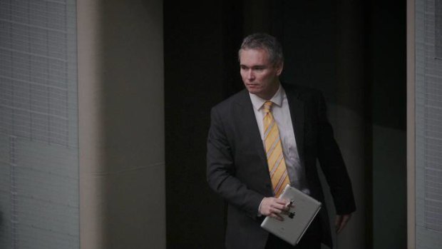 Independent MP Craig Thomson exits Question Time at Parliament House in Canberra on Wednesday 30 May 2012.