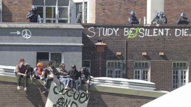 Riot police stand by as the students stage their protest at St Michael's College in Sydney.