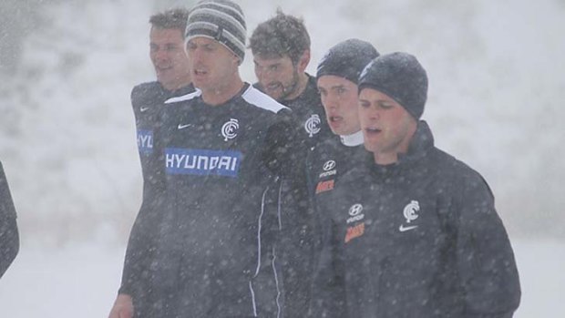 Blues players buck the winter chill at their pre-season training camp amid the snowfields of Arizona, US.