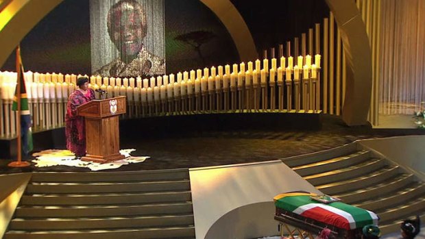 Malawi's President Joyce Banda talking during the funeral service of late former South African President Nelson Mandela in his childhood village of Qunu.