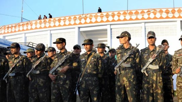Hear this . . . commandos listen to a security briefing in Jaipur, India.
