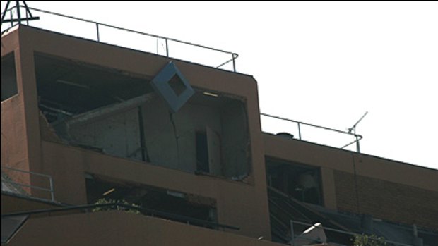 Explosion ... a blast has damaged the top of this Bondi Junction building.