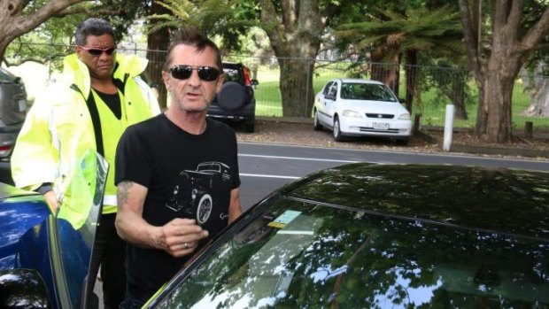 AC/DC drummer Phil Rudd outside court in Tauranga on Wednesday.