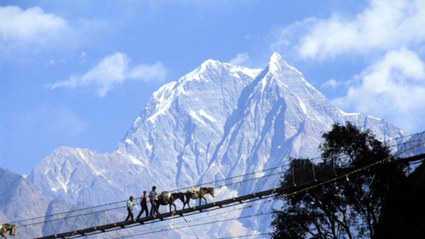 High way .... a suspension footbridge above the Kali Gandaki river.