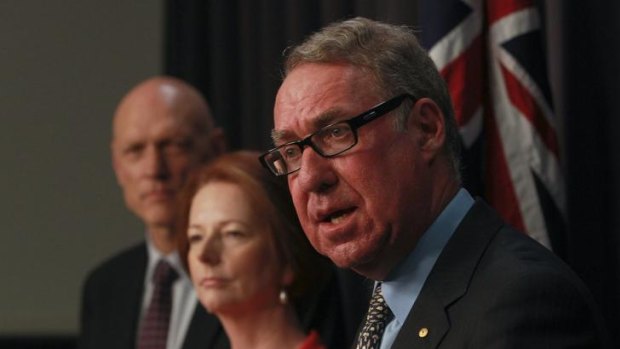 David Gonski, right, answers questions at the release of his schools report while Peter Garrett and Julia Gillard look on.