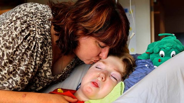 Comfort: Jo-ann Morris with severely disabled son Samuel in palliative care at Bear Cottage.