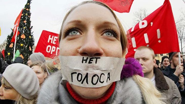 "No vote" ... a protester in St. Petersburg sends a message to Russia Prime Minister Vladimir Putin.