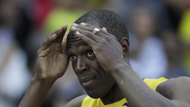 Jamaica's Usain Bolt cruised through his heat.