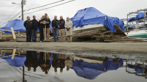 Putting aside differences ... US President Barack Obama and New Jersey Governor Chris Christie toured storm-stricken parts of New Jersey together.