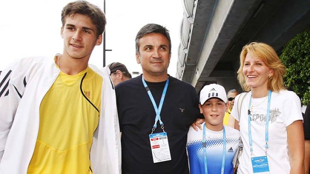 Recovering from illness ... Srdjan  Djokovic with his wife Dijana and sons Marko, left and Djordje at the Australian Open in 2008.
