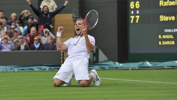 "Very happy": Steve Darcis celebrates his win.