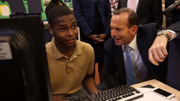 Prime Minister Tony Abbott at the  Pathways in Technology Early College High School in Brooklyn. He is considering bringing the model to Australia.