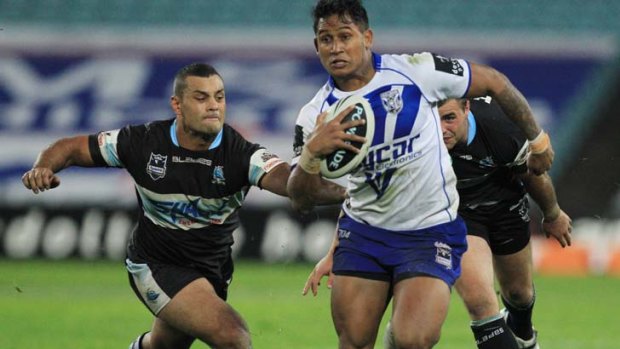 Winning form ... Ben Barba of the Bulldogs makes a break for the try line.