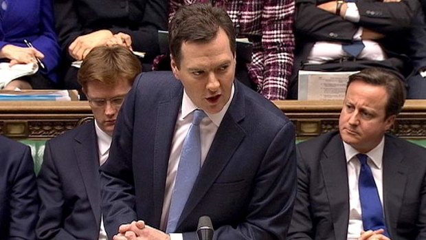 Britain's Chancellor of the Exchequer George Osborne ... delivering his budget to the House of Commons.