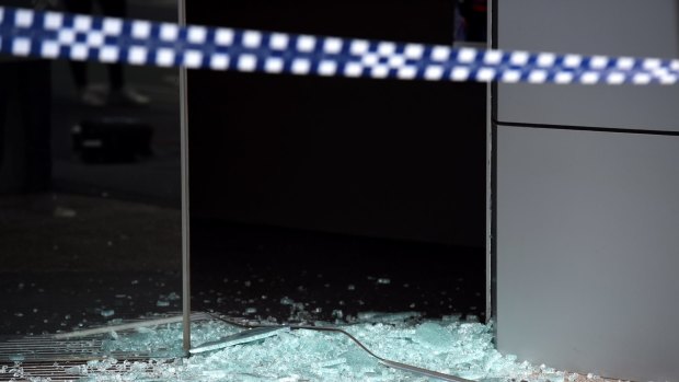 Shattered glass resulting from shots fired into the CFMEU building on Swanston Street