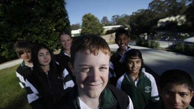 Vital study ... Tom McGill, whose behaviour will be tracked, with other students at John Therry Catholic High School in Rosemeadow.