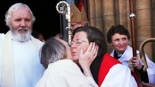 Hallelujah: The new Bishop Darling is congratulated outside St Paul's Cathedral after her consecration yesterday.