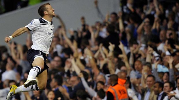 Tottenham Hotspur's Rafael van der Vaart celebrates equalising against Arsenal.