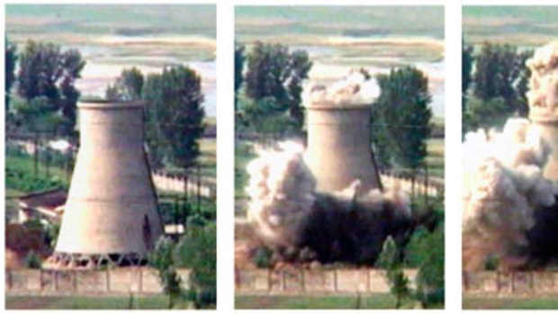 The demolition of the 60-foot-tall cooling tower at its main reactor complex in Yongbyon.