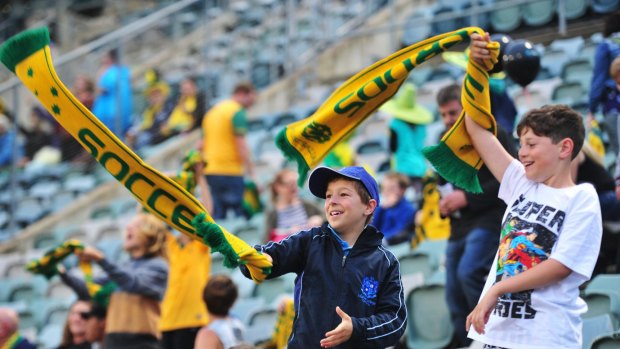  From left, Johnny Frilingos,10 of Chifley and Luca Brancella of Kambah at GIO Stadium in Canberra to see the Socceroos take on Kyrgyzstan in the World Cup qualifier.  