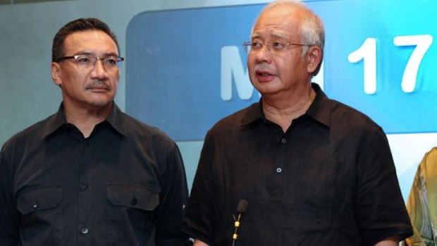 Hishammuddin Hussein (L) with Malaysian Prime Minister Najib Razak.
