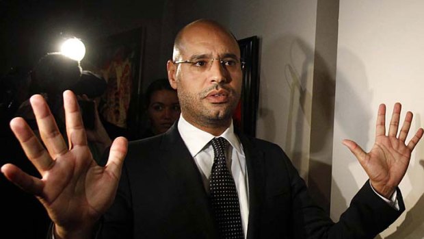 Saif al-Islam Gaddafi ... says bombs were intended just to frighten rebels.