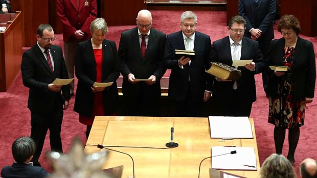 Victorian senators, including Liberal Scott Ryan, second from the right, during Monday's swearing-in ceremony.