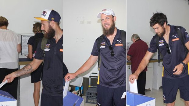 West Coast Eagles Chris Masten, Will Schofield and Josh Kennedy vote at the airport.