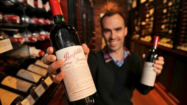 Ben O'Connor from Wine House in South Melbourne with a bottle of Penfolds Grange.