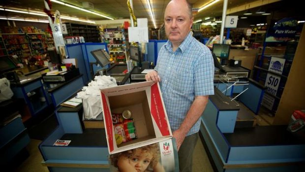 Wesley Mission Victoria's Rob Ward with donated food.