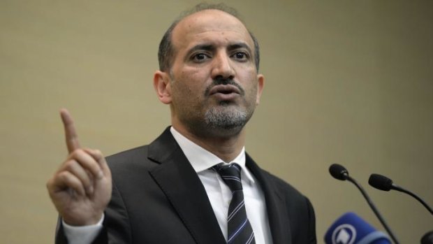 Syrian National Coalition (SNC) leader Ahmad Jarba speaks during a press conference at the "Geneva II" peace talks.