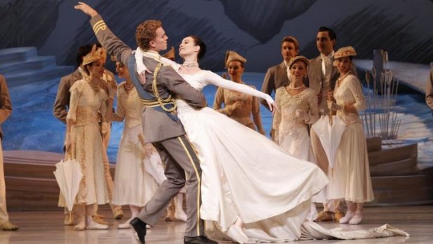 Adam Bull and Amber Scott, front, in the wedding scene from Graeme Murphy's  2013 <i>Swan Lake</i>.