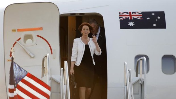 Julia Gillard arrives at O'Hare International Airport before the start of the NATO summit in Chicago.