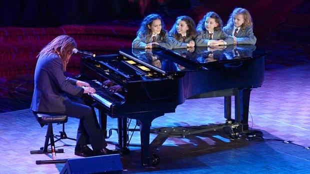 This boy just wants to have fun: Tim Minchin (above with cast of Matilda) is up against Cyndi Lauper for a Tony Award.