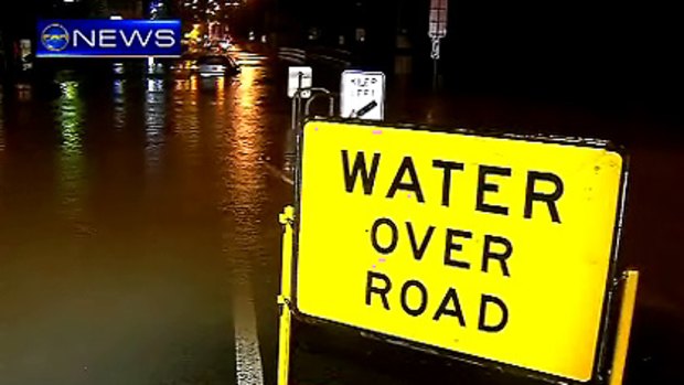 Water over a Brisbane road overnight.