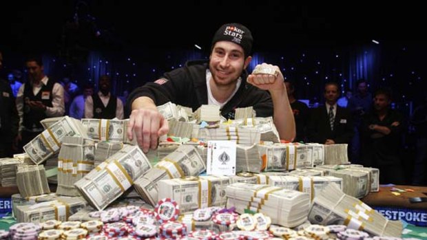 Smiling poker face ... Jonathan Duhamel poses after winning the World Series of Poker.