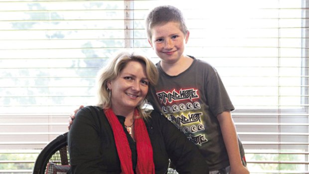 From safe and guided to facing a gap...Jo Hilder at home with her son, Gabriel, 9