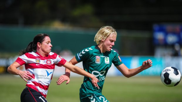 Canberra United defender Catherine Brown, right, will line up for Belconnen United in Sunday's Federation Cup final against Gungahlin United.