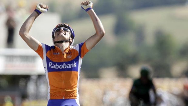 Rabobank rider Luis Leon Sanchez of Spain celebrates winning the ninth stage.