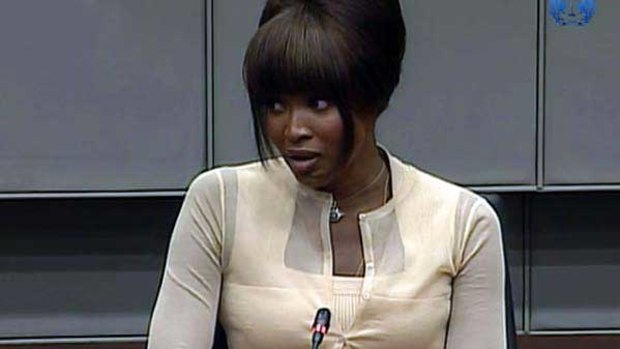 Naomi Campbell tells a war crimes court she received a gift of "dirty-looking stones" she assumed was from Liberia's Charles Taylor after a 1997 dinner hosted by Nelson Mandela. <i>Picture: AFP</i>